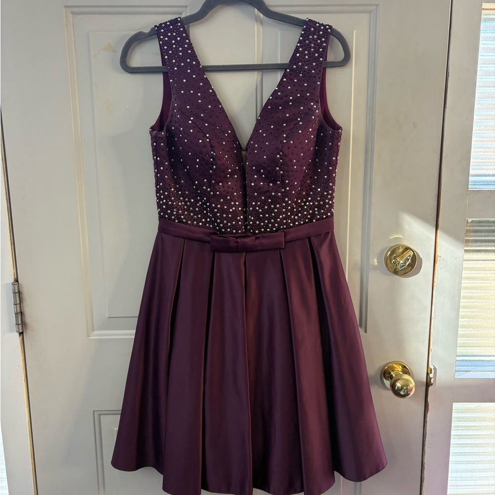 Dark Purple Sleeveless Dress with Pearl Embellishments